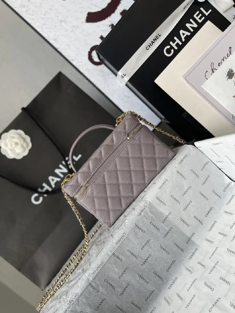View 12 of Lavender Quilted Mini Bag with Gold Chain & Top Handle