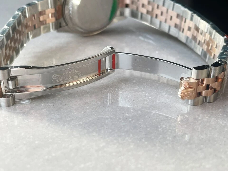 View 9 of Rolex Datejust 28mm 904L RG/SS Champagne Dial A2671