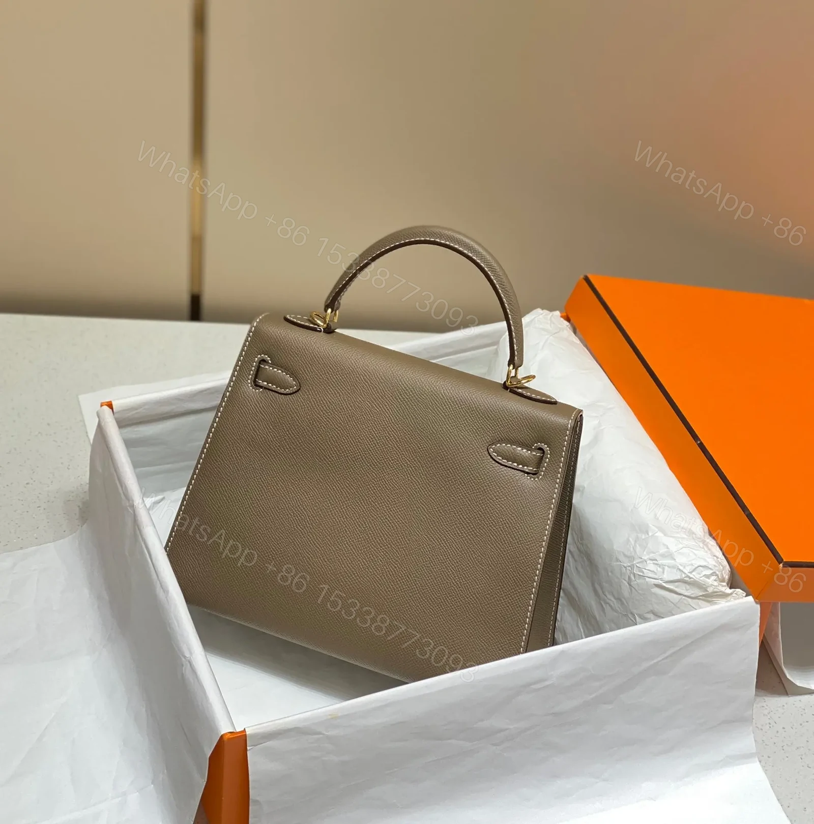 View 8 of HN 25 bag in Etoupe Epsom leather with gold hardware