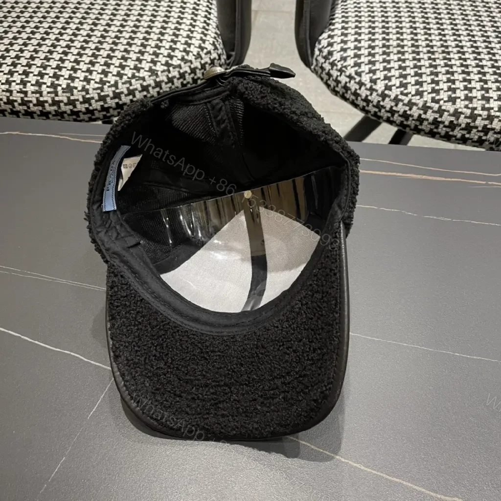 View 10 of Textured Luxury Cap: Fleece Crown, Leather-Like Brim, Minimal Prada Flair