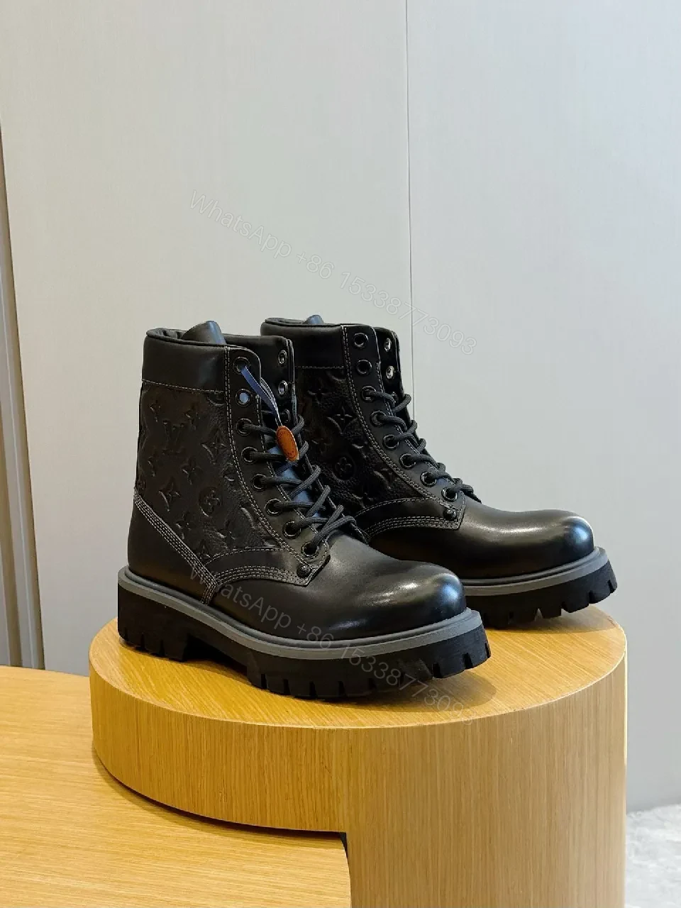 View 3 of Bold Textured Leather Combat Boots with Luxe Detailing