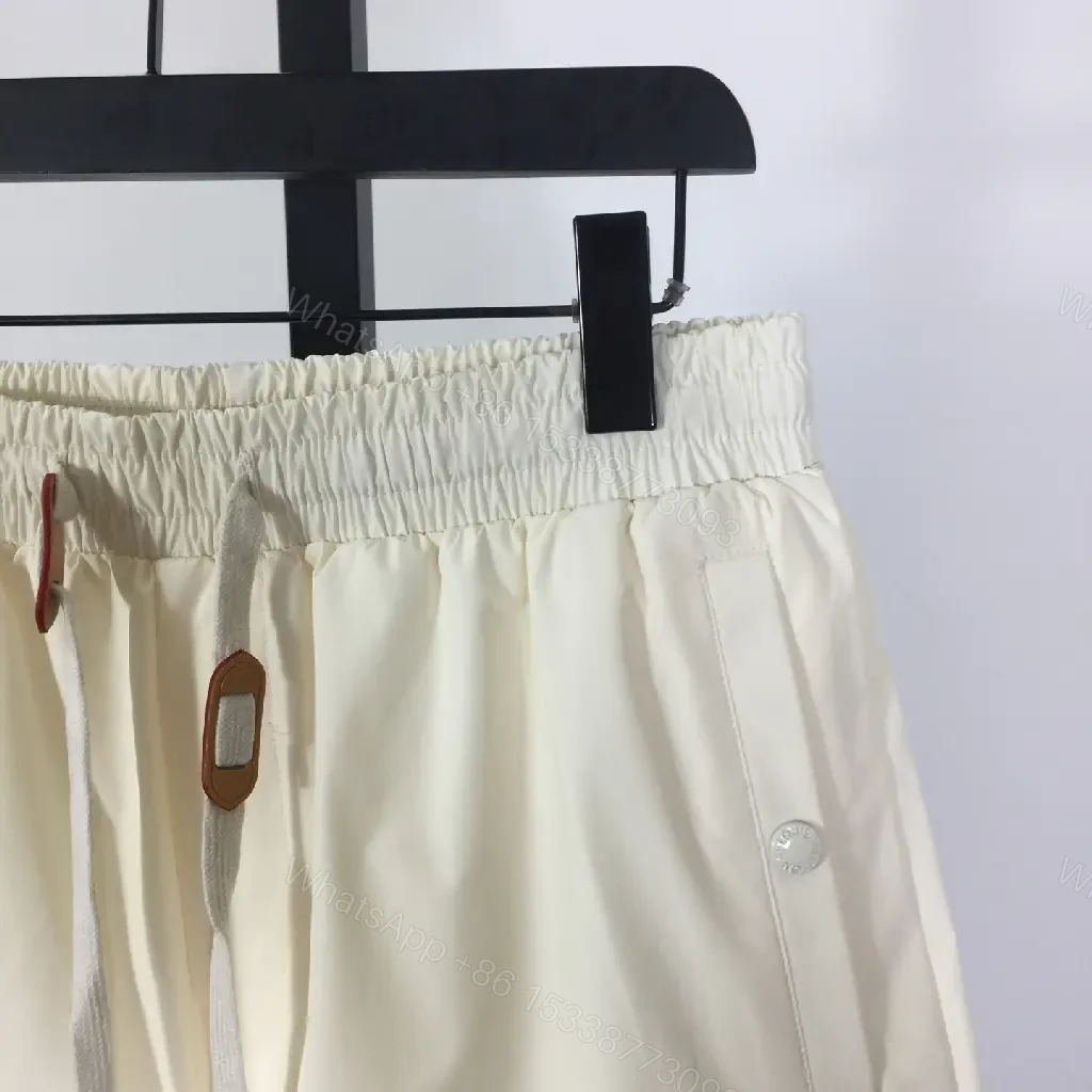 View 2 of Cream Canvas Shorts - Relaxed Style, Drawstring Waist, LV Logo