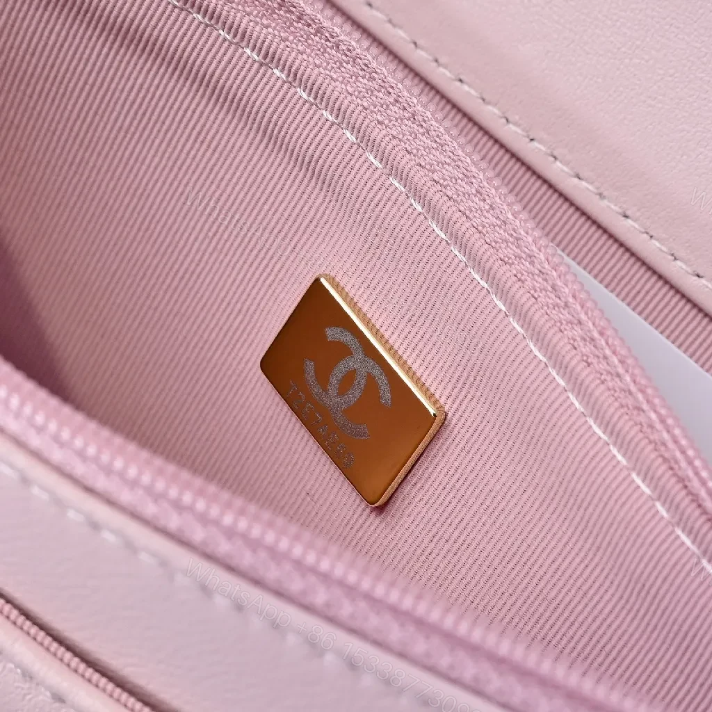 View 3 of Soft Pink Quilted Mini Bag with Gold Chain, Satin Texture, Everyday Luxury