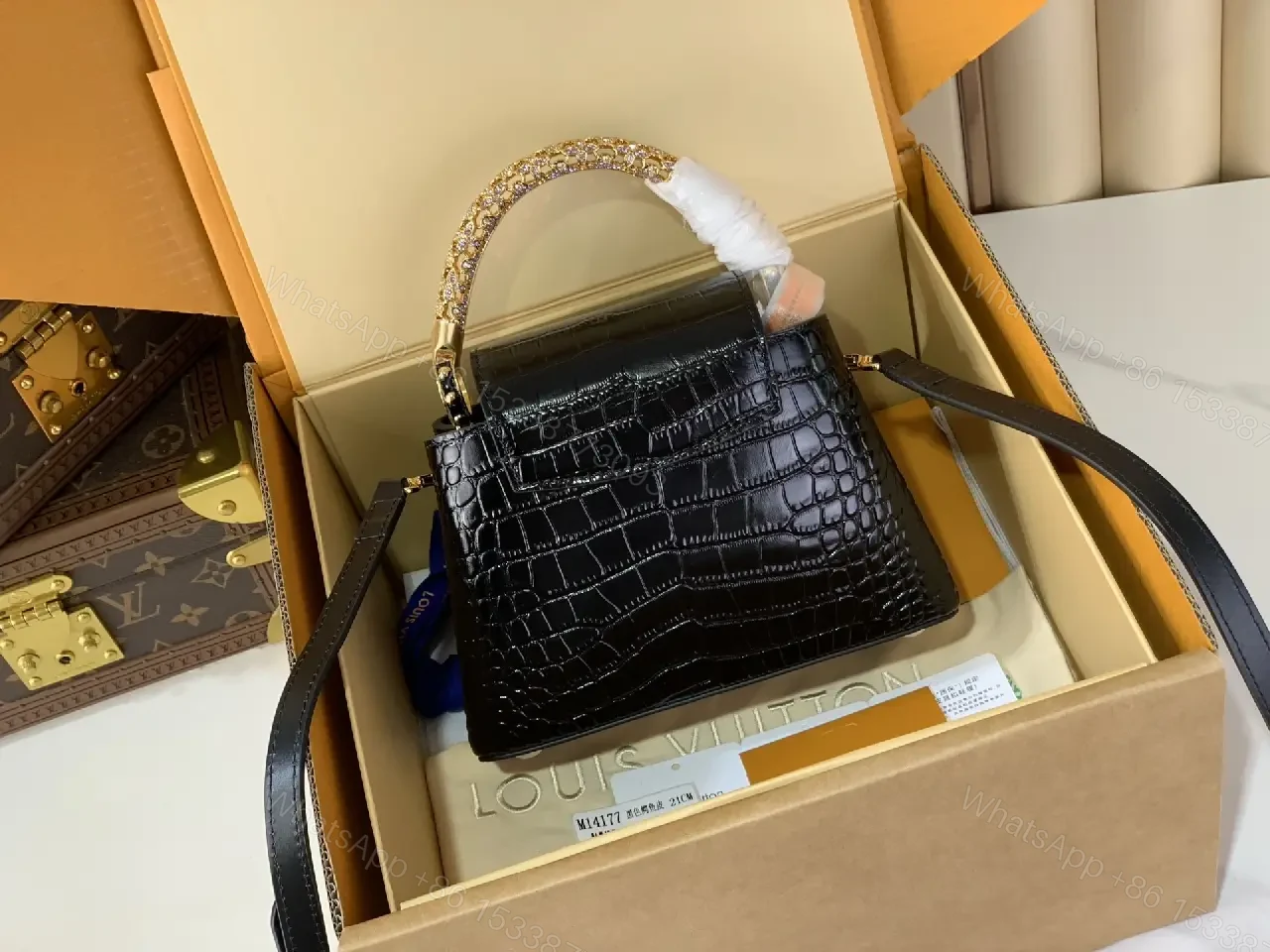 View 5 of Chic Black Crocodile-Embossed Mini Handbag with Gold Hardware