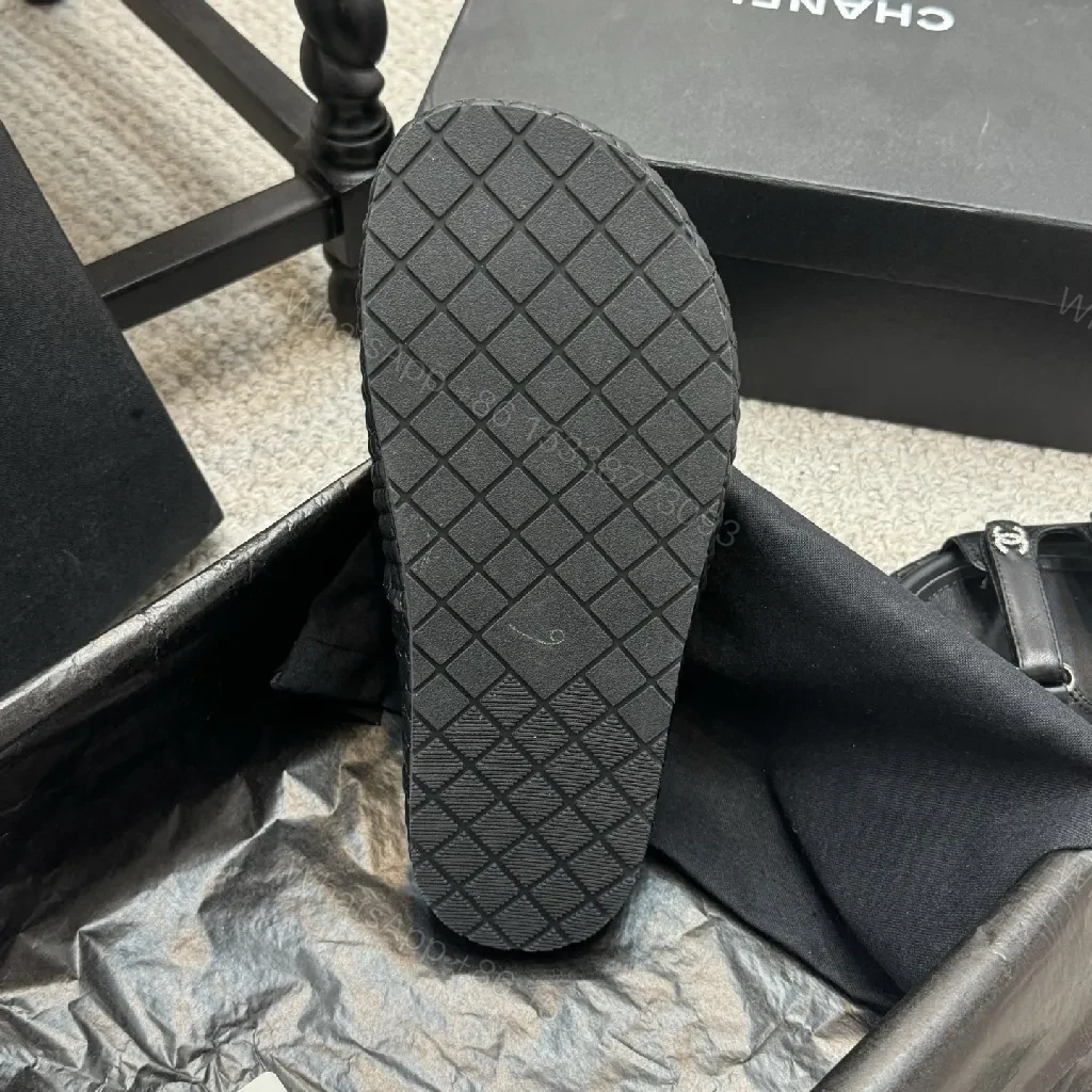 View 7 of Minimalist Black Leather Sandals with Subtle Logo Hardware