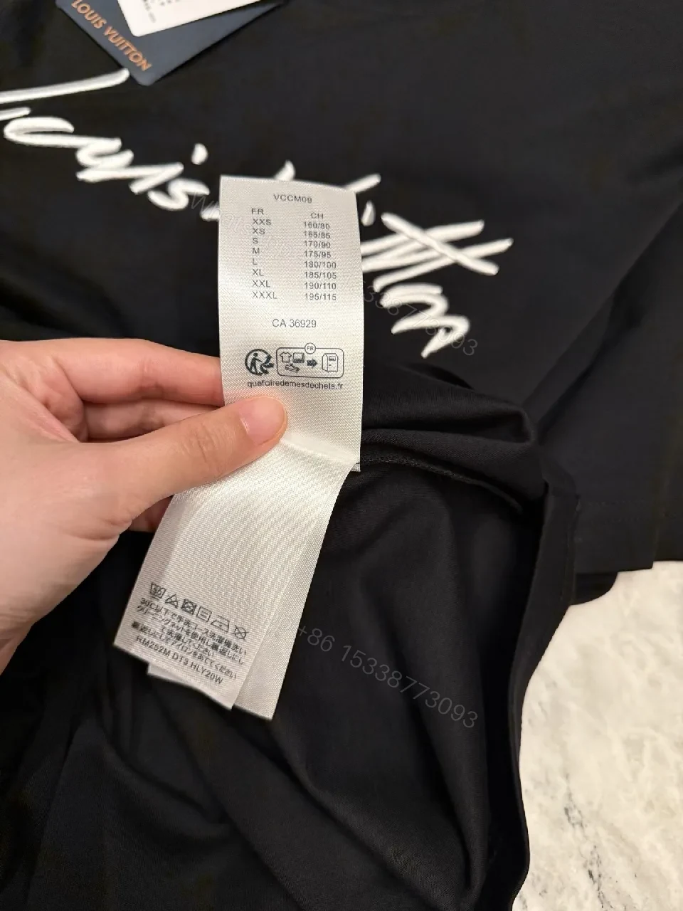 View 3 of Black Cotton Tee with Signature Brushstroke Logo, Modern Fit, Premium Comfort
