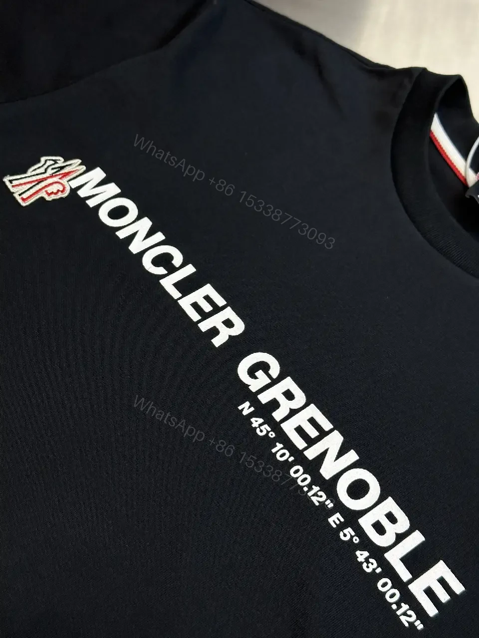 View 2 of Minimalist Black Tee with Logo Crest, Relaxed Fit, Premium Cotton