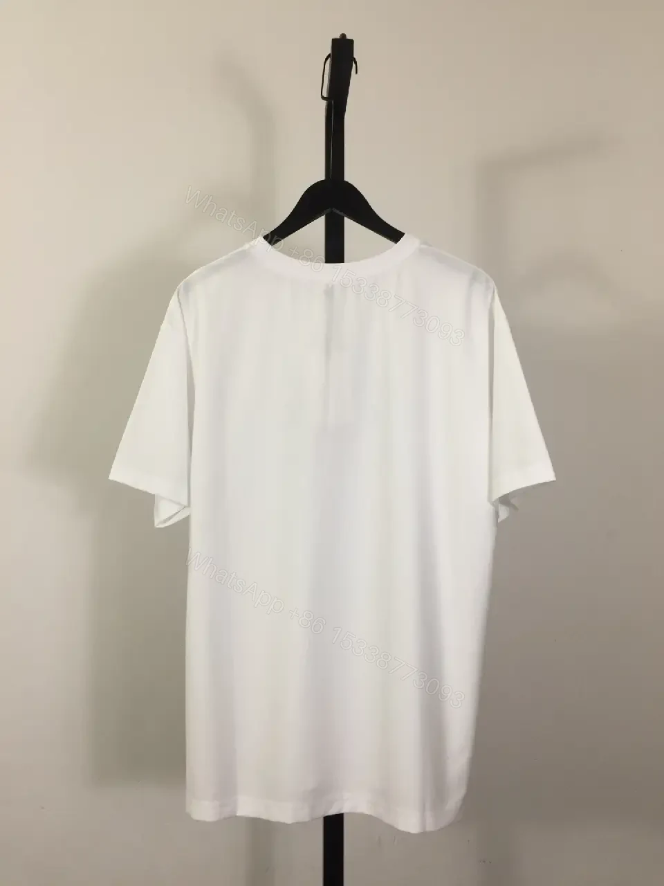 View 7 of White Cotton Logo Tee — Minimalist, Modern, Versatile