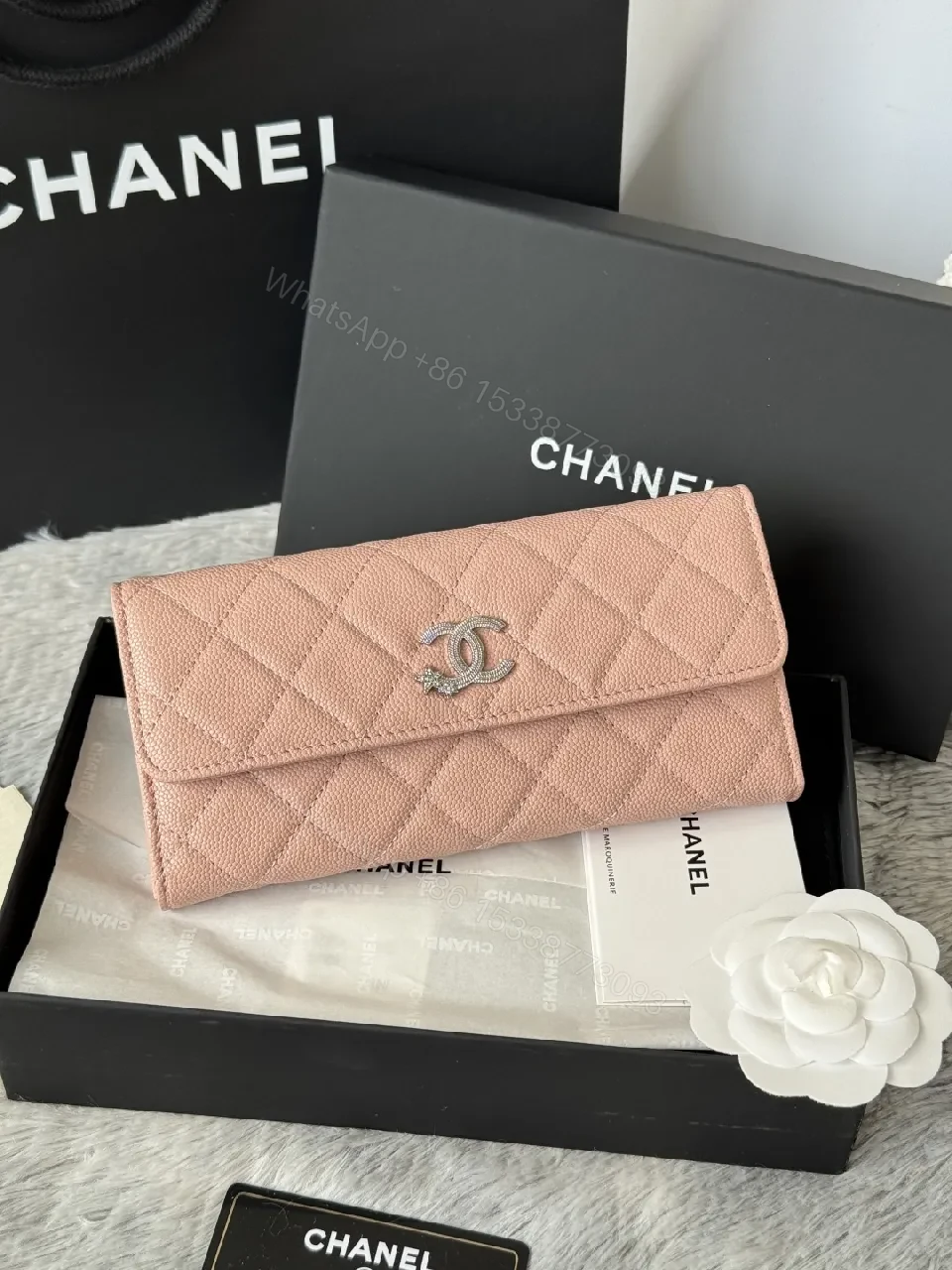 View 11 of Soft Pink Quilted Wallet with Silver Emblem - Compact Luxury Wallet