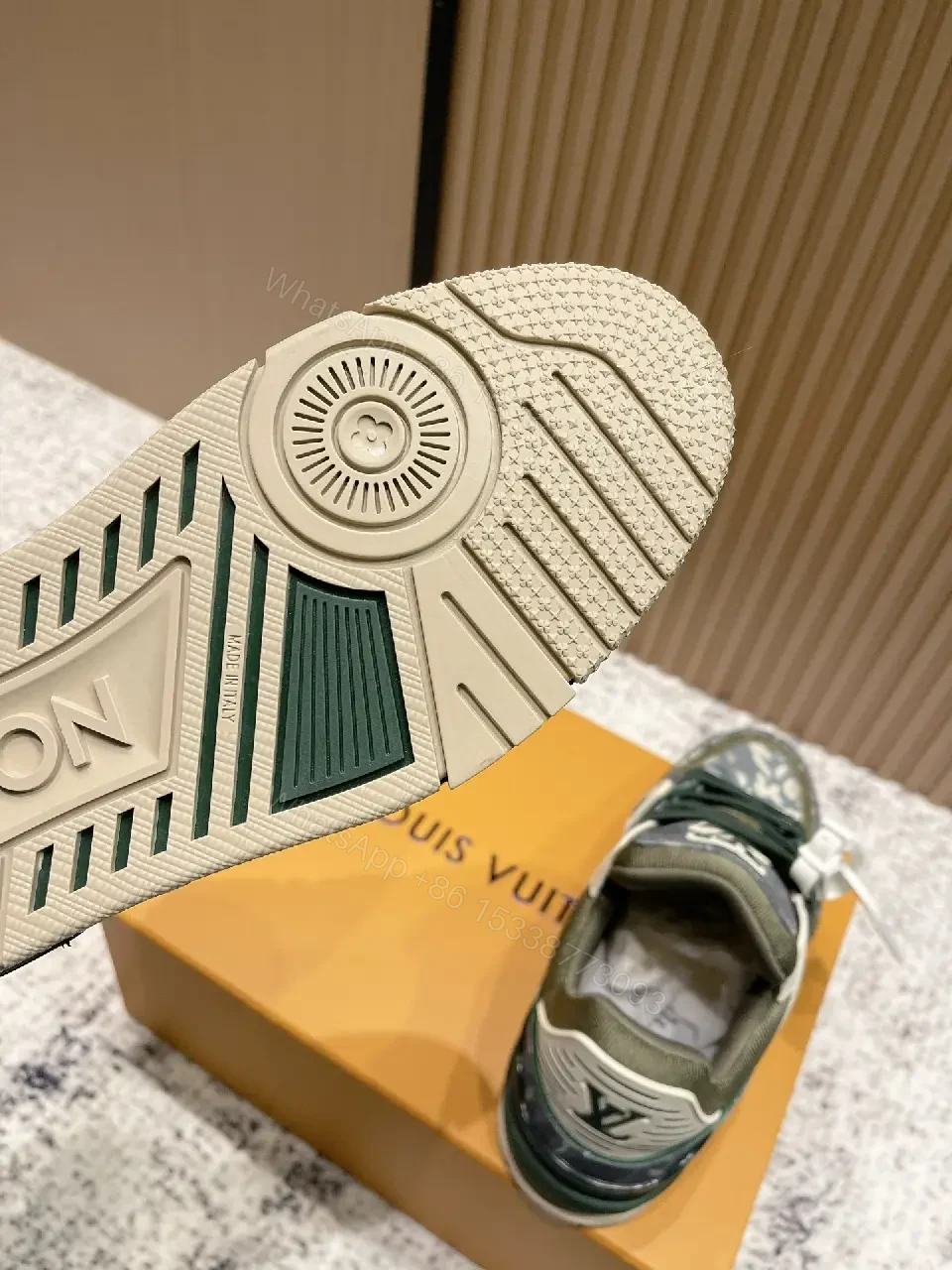 View 5 of Denim Textured Sneaker with LV Detailing, Modern Couture Outdoors
