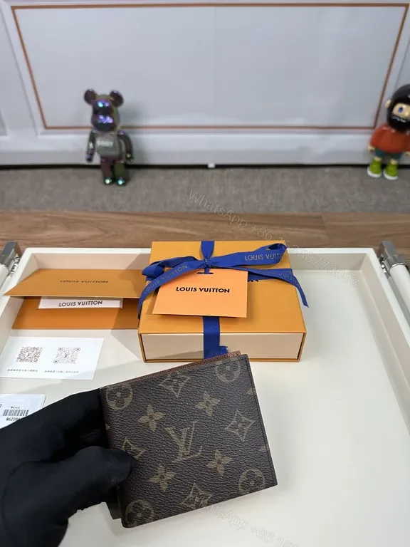 View 4 of Monogram Leather Wallet: Classic Louis Vuitton Bi-Fold, Slim Profile