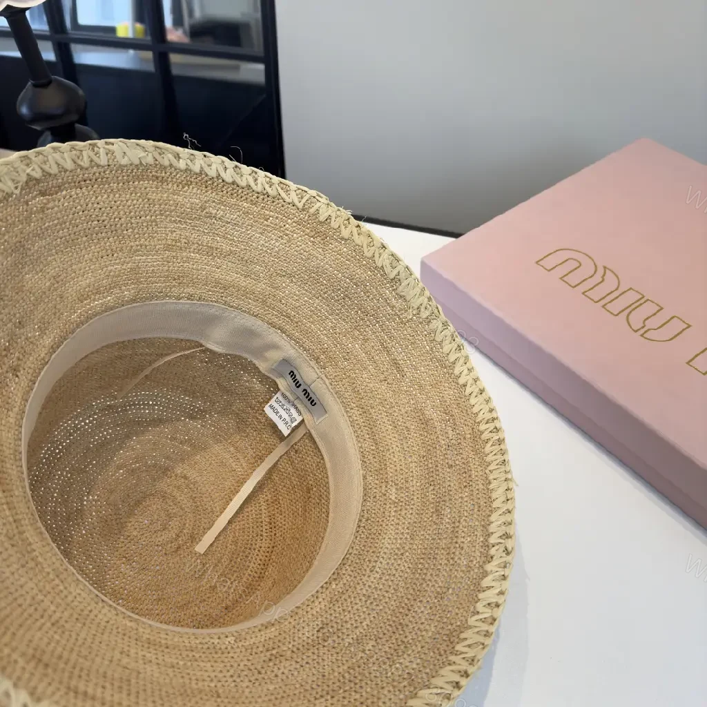 View 5 of Natural Straw Bucket Hat with Subtle Logo Detail