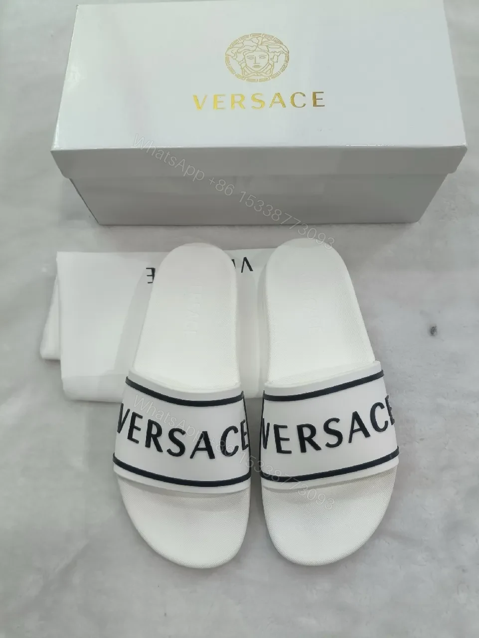 View 8 of White Leather Slide with Bold Brand Stripe, Unisex Comfort