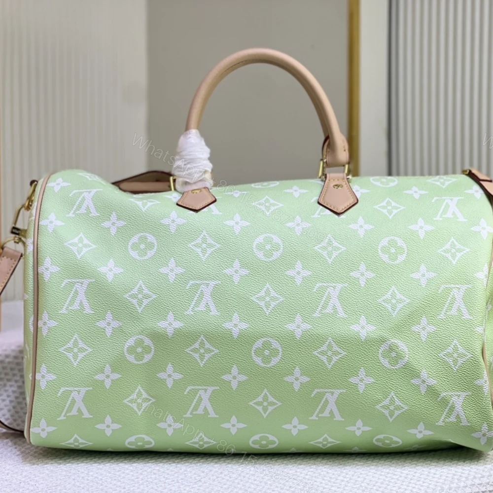 View 3 of Louis Vuitton Speedy P9 Bandoulière 25 Mint 40Cm