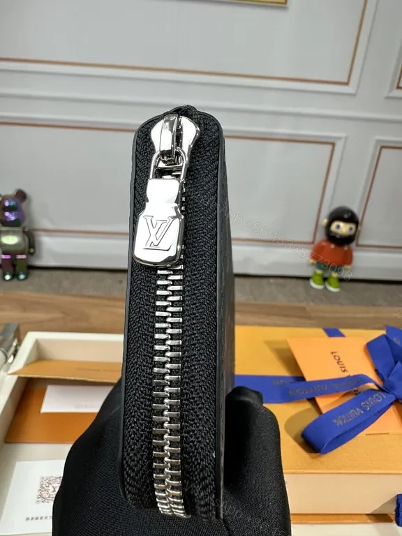 View 6 of Refined Monogram Zip Wallet: Luxury Texture, Everyday Versatility