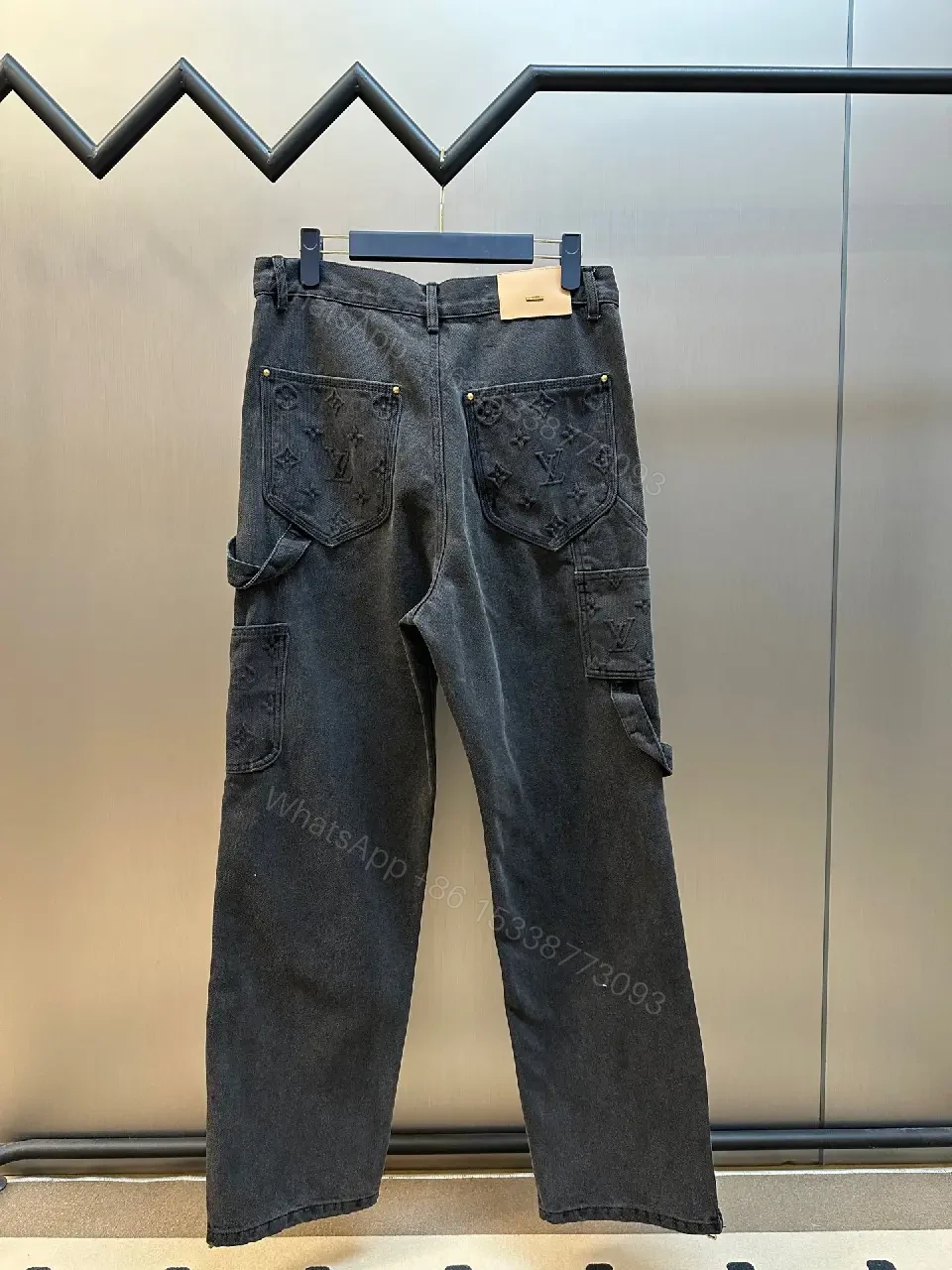 View 2 of Dark-Wave Denim Pant: Premium Monogram Texture, Modern Fit