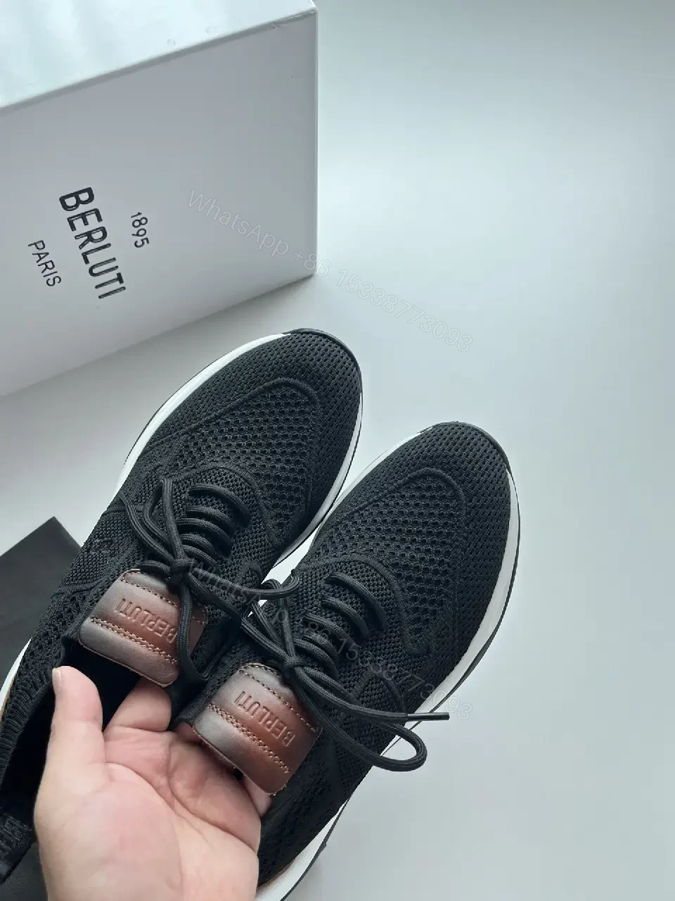 View 7 of Black knit sneakers with leather trim for everyday luxury and comfort