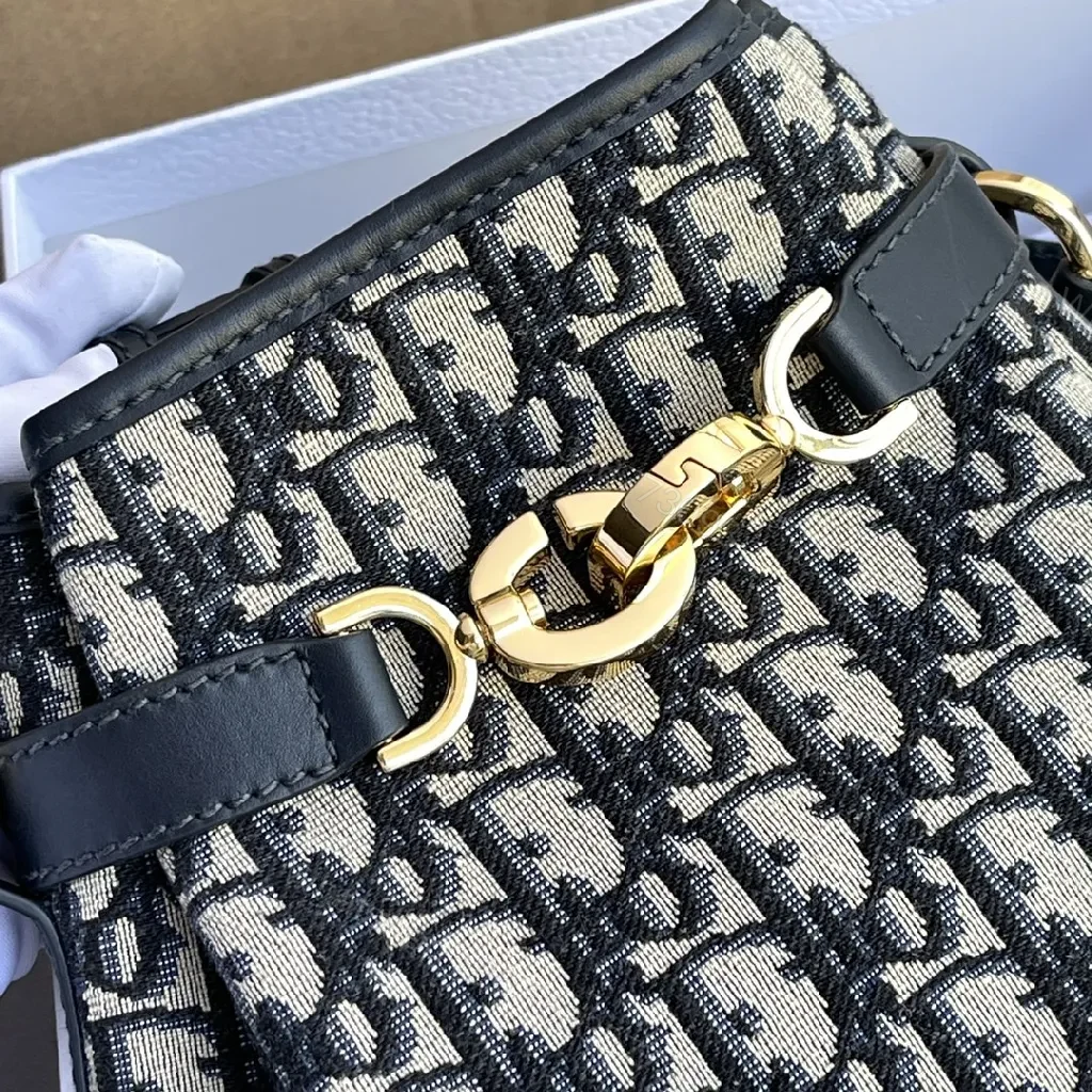 View 9 of Structured Classic Monogram Canvas Bucket Bag with Gold Hardware