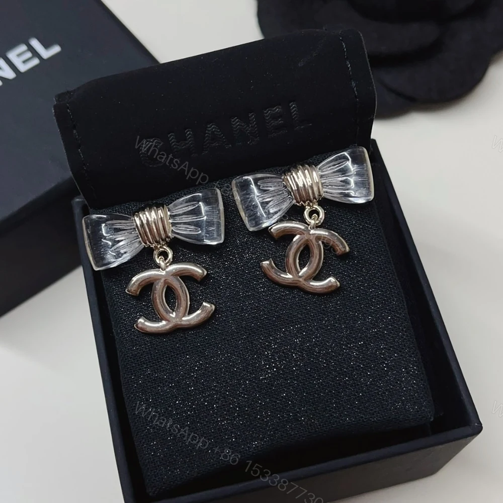 View 8 of CHANEL D25 CC BOW EARRINGS GOLD METAL ABF537 B19997 NAFVG