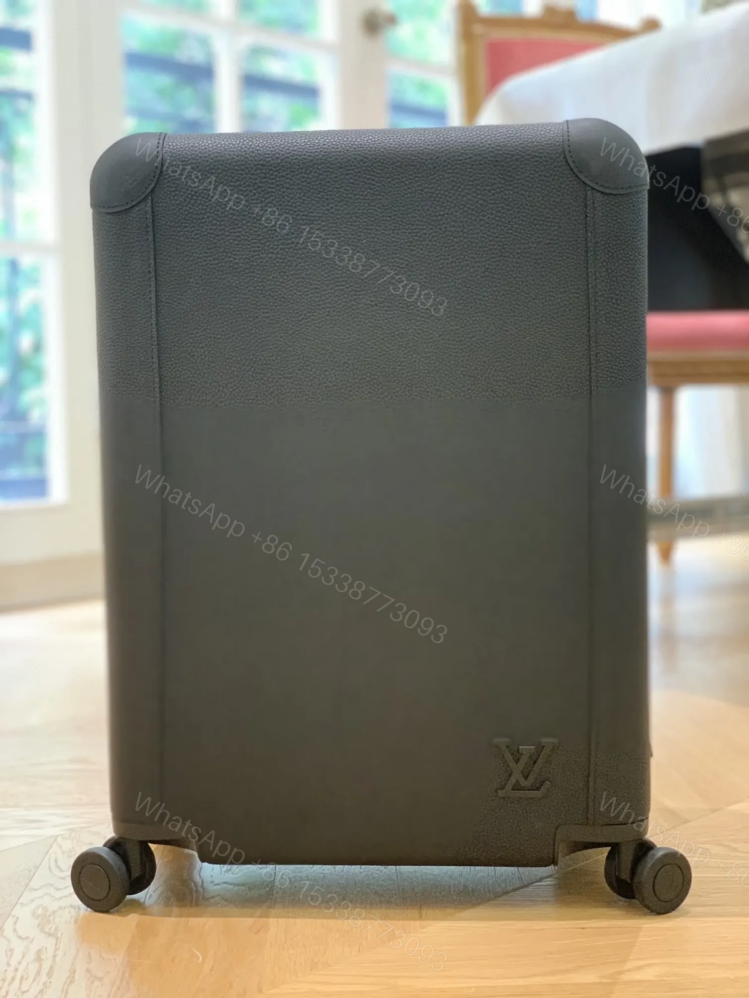 View 2 of Louis Vuitton Horizon 55 rolling suitcase in Black