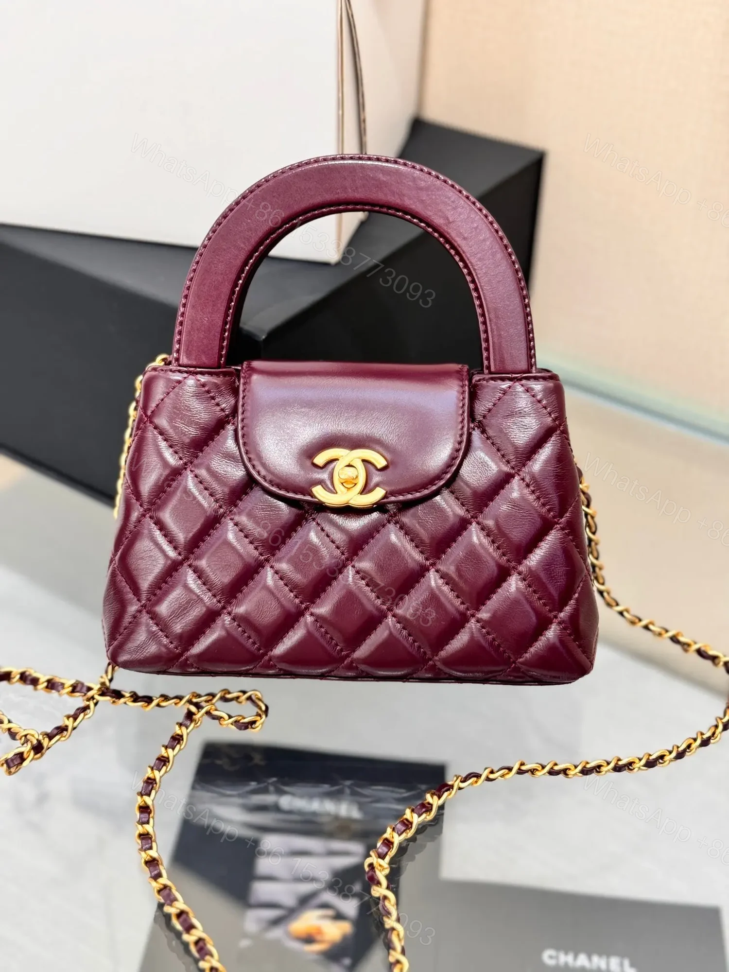 CHANEL KELLY 19 IN WINE RED LAMBSKIN WITH GOLD HARDWARE — view 1