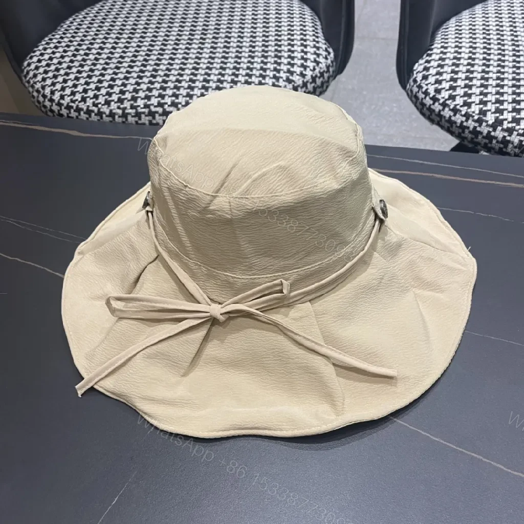 View 10 of Beige Textured Bucket Hat with Emblem, Everyday Luxury
