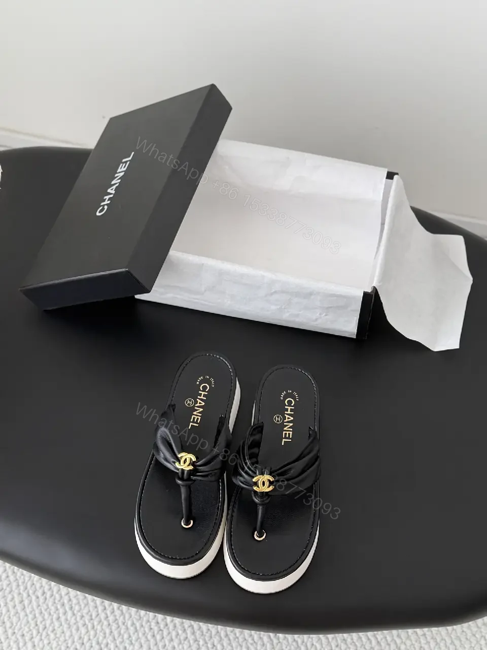 View 8 of Black Leather Slide Sandals with Gold Chanel Logo