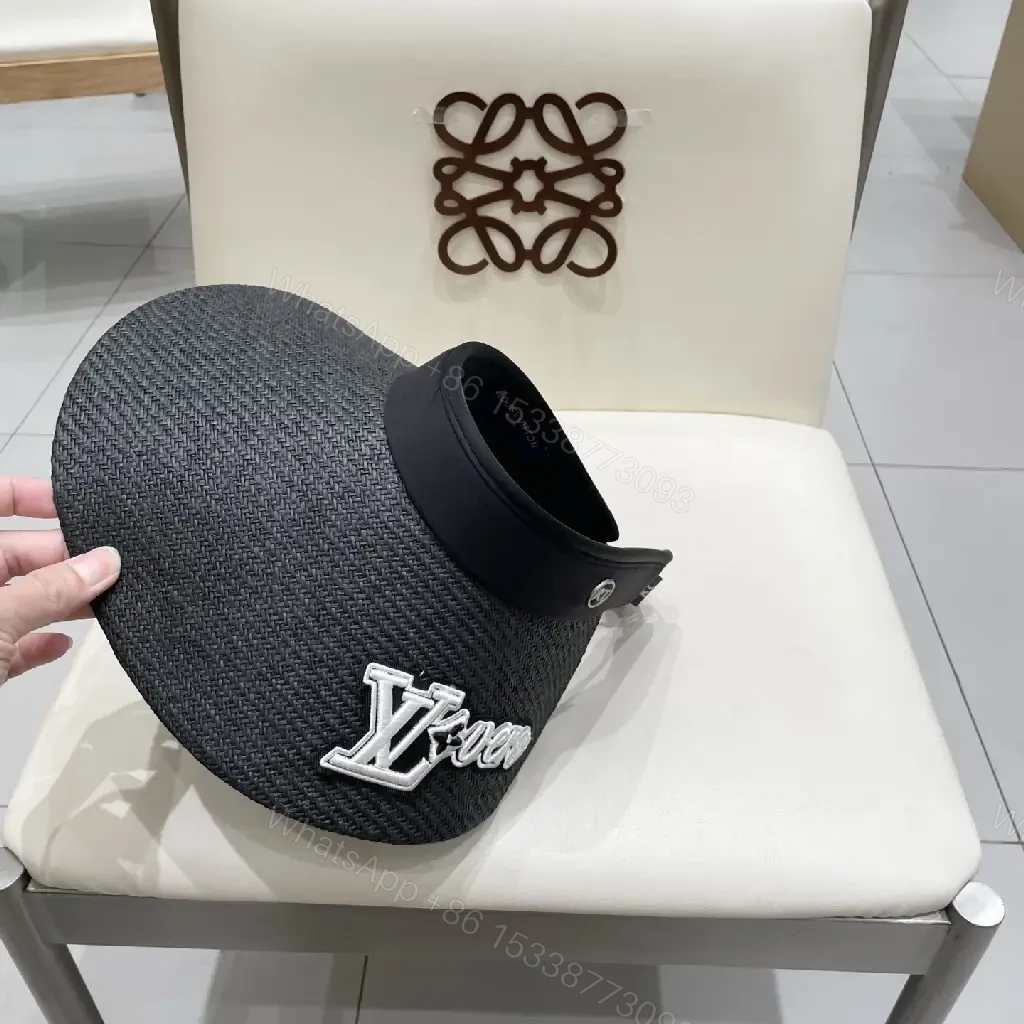 View 8 of Bold Sun Visor with LV Flair: Luxury-Casual Headwear