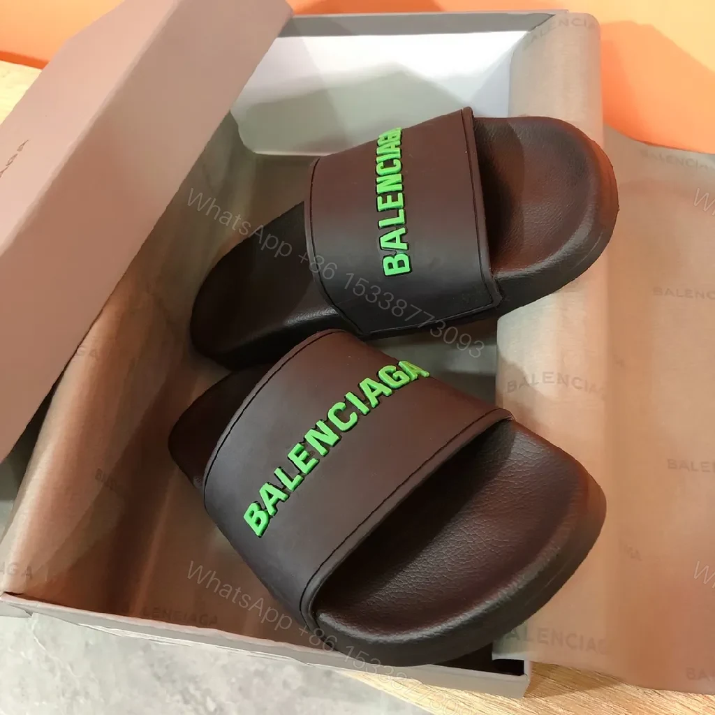 View 6 of Bold Neon Logo Slides: Black Comfort, Statement Style