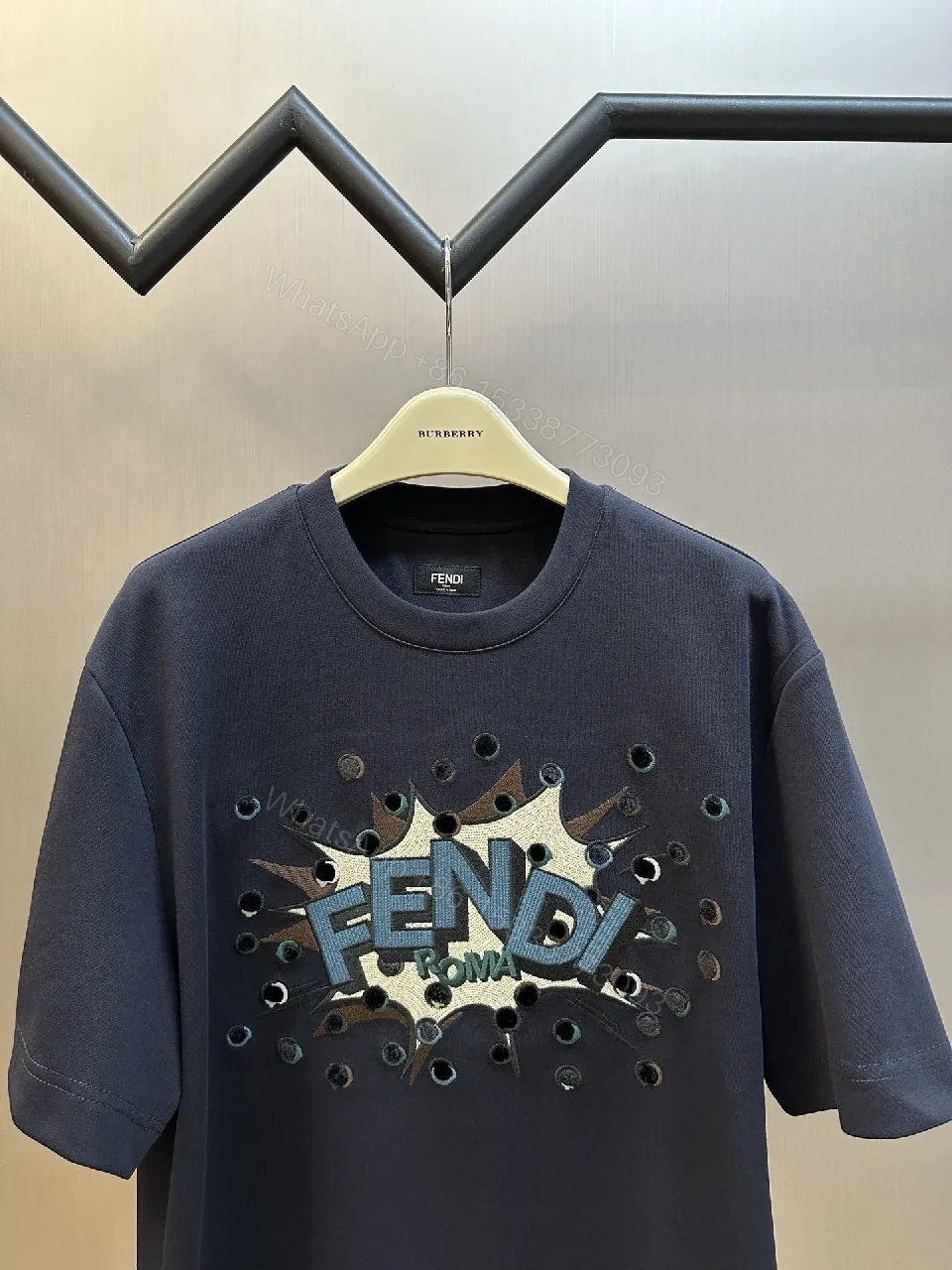 View 2 of Bold Logo Grafitti Tee: Premium Cotton, Cutouts, Navy