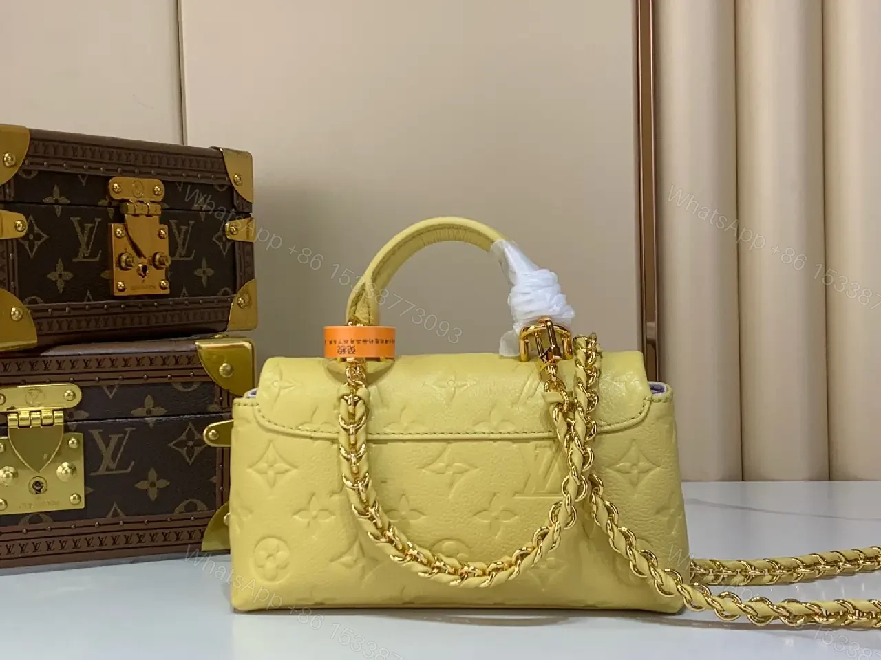 View 5 of Pale Yellow Embossed Satchel: Lux Vintage Top-Handle Bag
