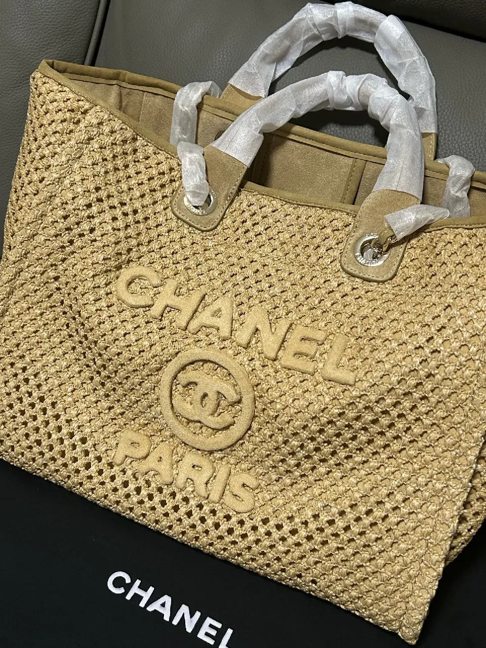 View 8 of Natural Straw Tote in Beige with Leather Trim, CHANEL-Embossed, Open-Top Tote