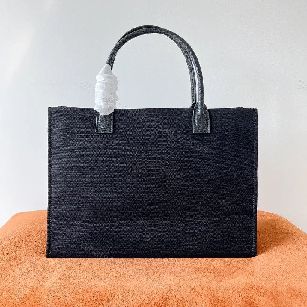 View 4 of Structured Sophistication Tote: Black, Matte Shell, Modern Luxury, Gold Hardware