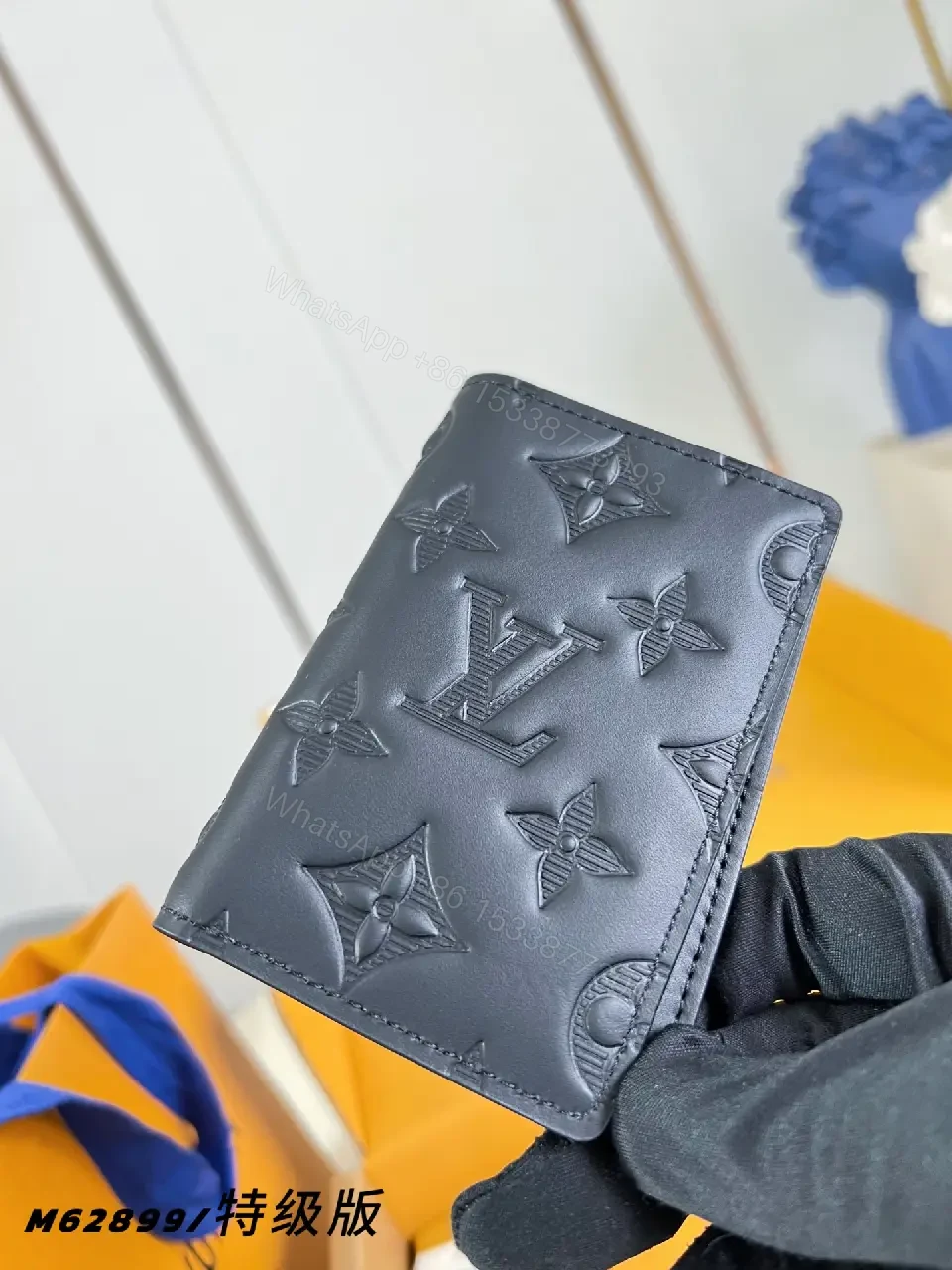 View 5 of Black Leather Slim Bi-Fold Wallet with Embossed LV Pattern
