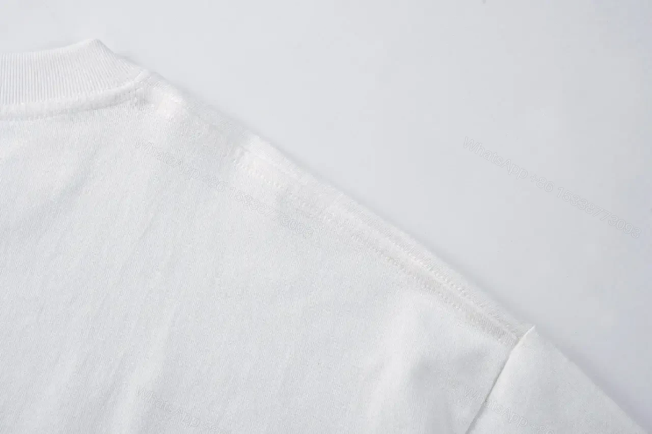 View 6 of White Cotton Minimalist Graphic Tee with Pearlescent Accent