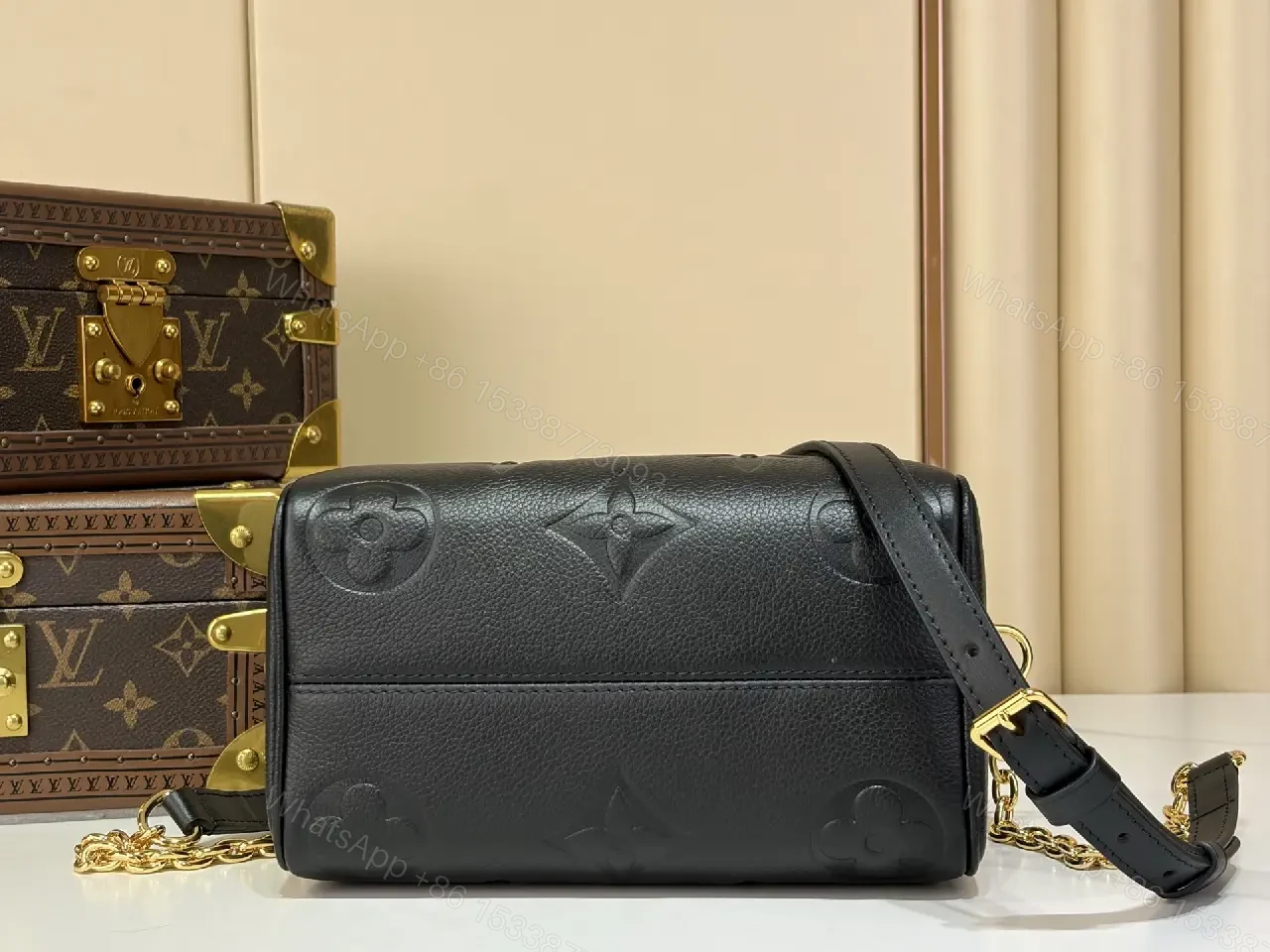 View 2 of Black Pebbled Leather Dome Handbag with Gold Details