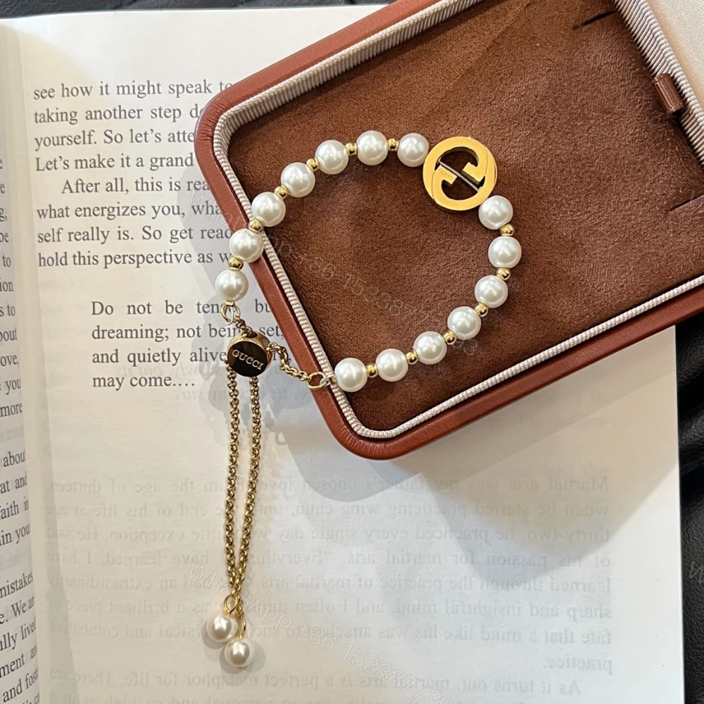View 3 of Gucci Interlocking Pearl Bracelet Gold ‎839033 JCF27 8062