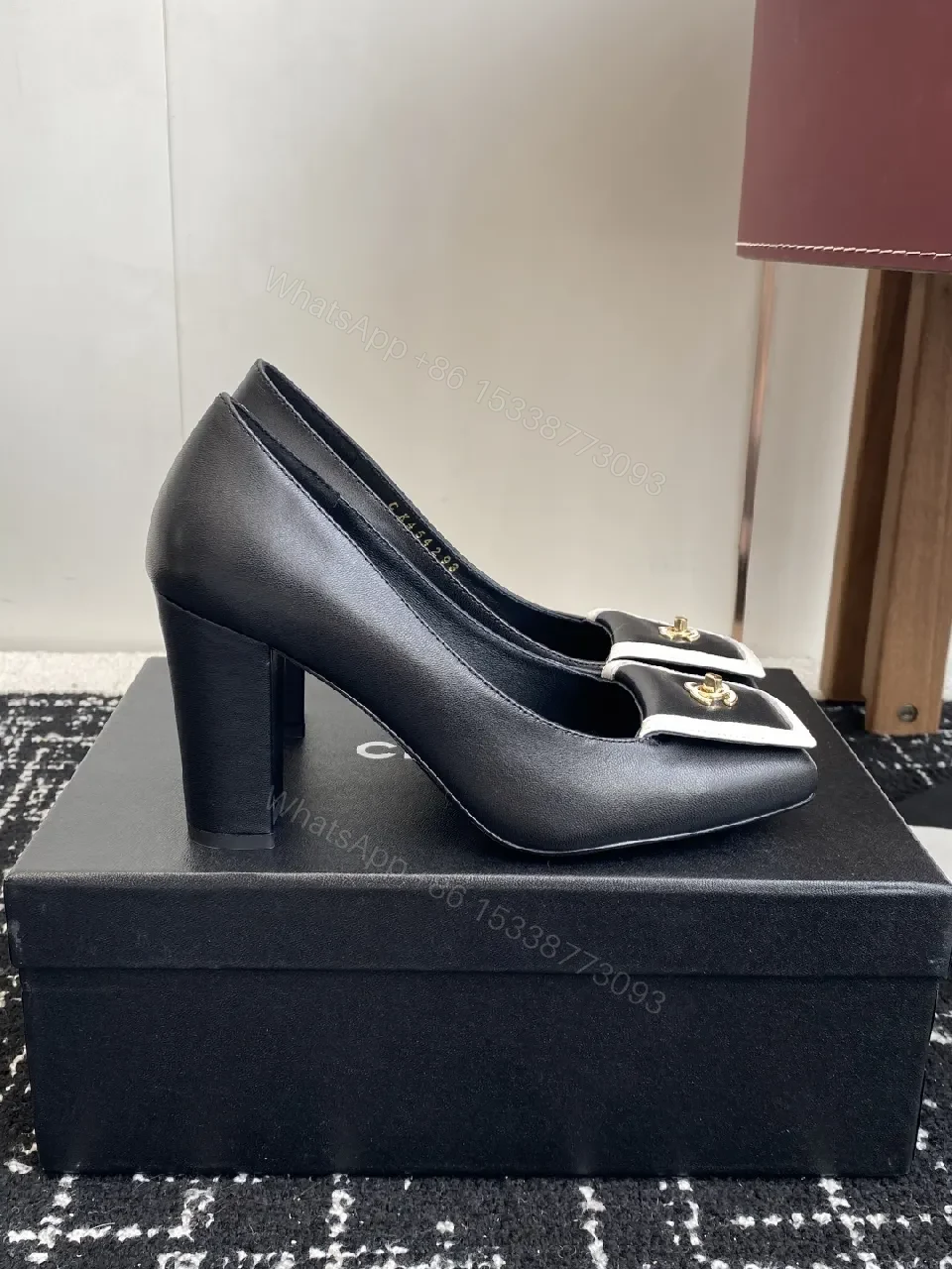 View 7 of Chic Black Leather Heels with White Trim Detail Pumps
