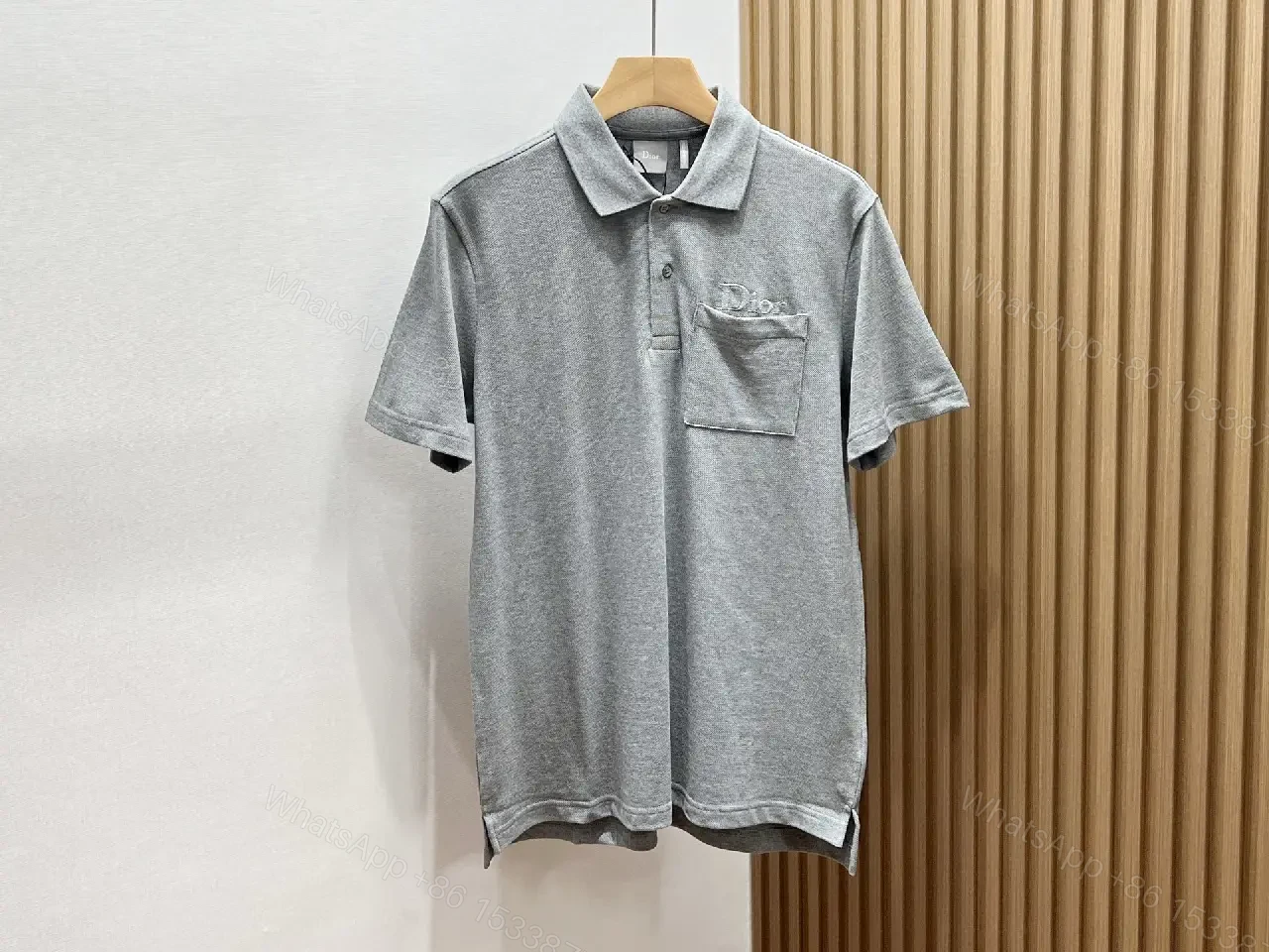 View 4 of Minimalist White Cotton Polo with Subtle Detailing
