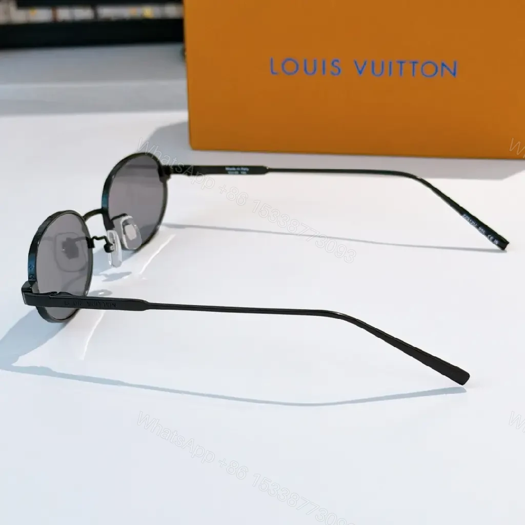 View 9 of Elegant Oval Sunglasses – Silver Metal, Polarized, Luxury Style
