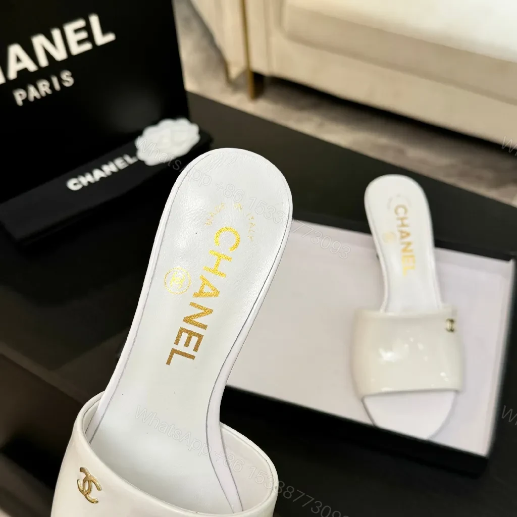 View 2 of White Patent Mules with Gold Logo – Elevating Everyday Glam