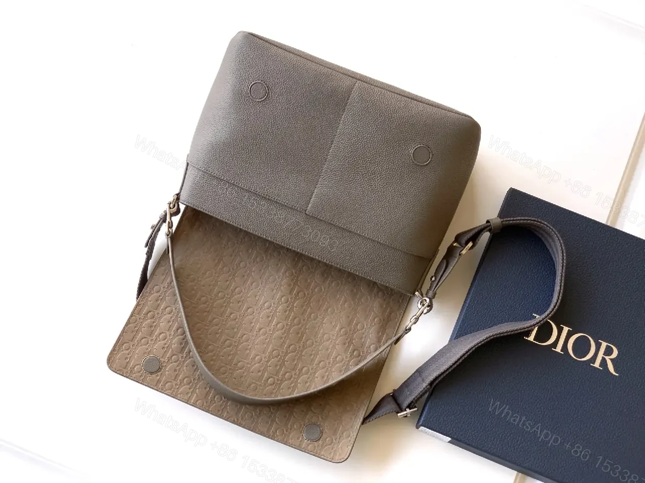 View 3 of Pebble Leather Crossbody: Subtle Branding, Quiet Luxury