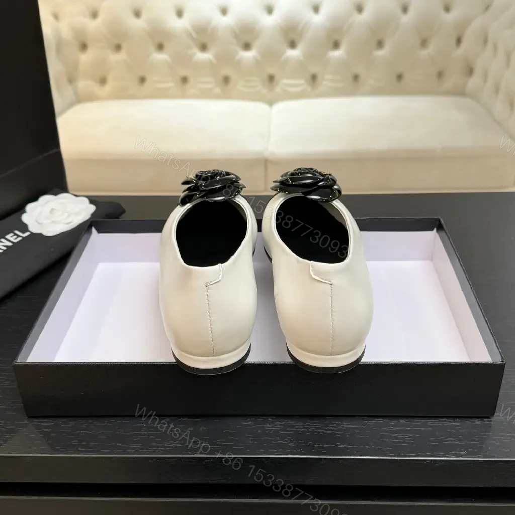 View 6 of Chic White & Black Ballet Flats with Rose Embellishment