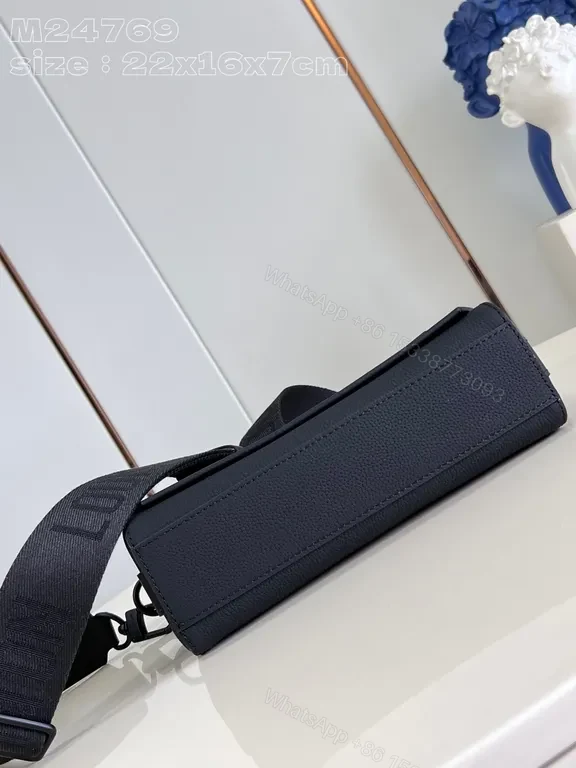 View 8 of Chic Compact Messenger: Luxury Leather, Subtle LV Emblem