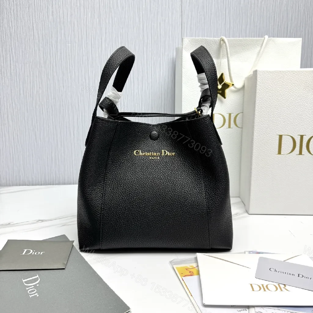 Compact Black Pebbled Bucket Bag - Structured Luxury Everyday — view 1