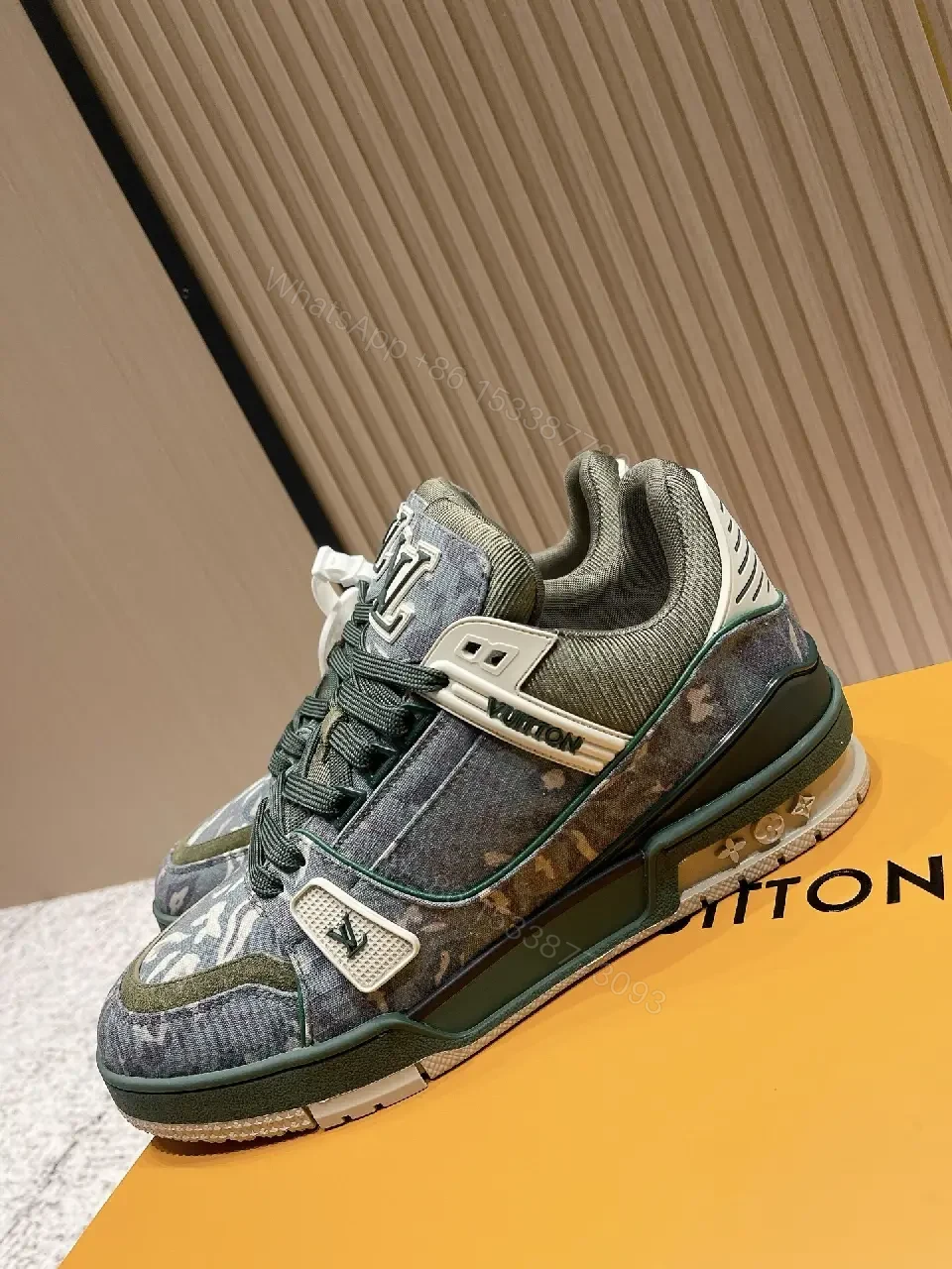 View 9 of Denim Textured Sneaker with LV Detailing, Modern Couture Outdoors