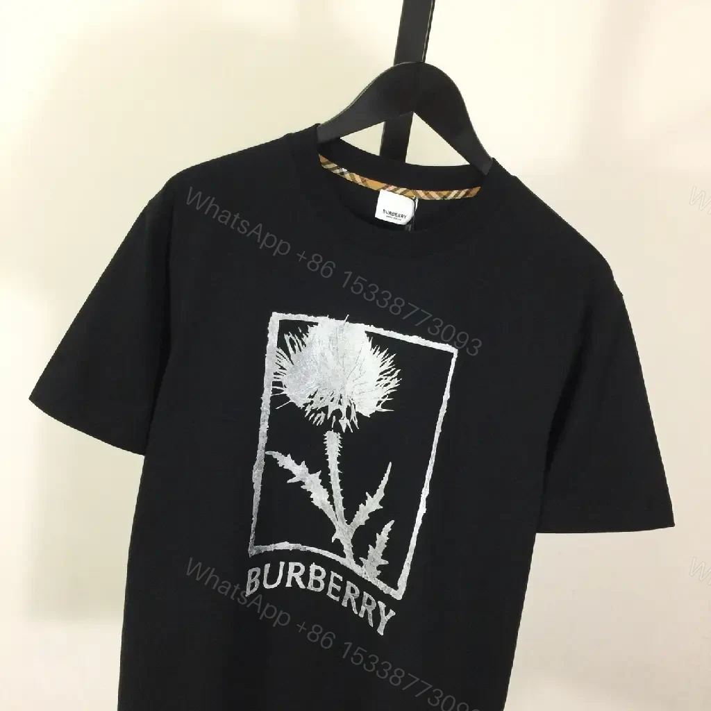 View 4 of Minimalist Black Cotton Tee with Graphic Burberry-Inspired Emblem