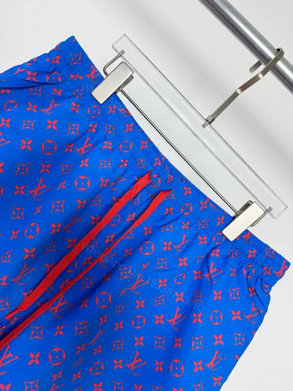 View 4 of Blue Louis Vuitton Monogram Swim Shorts with Red Drawstring