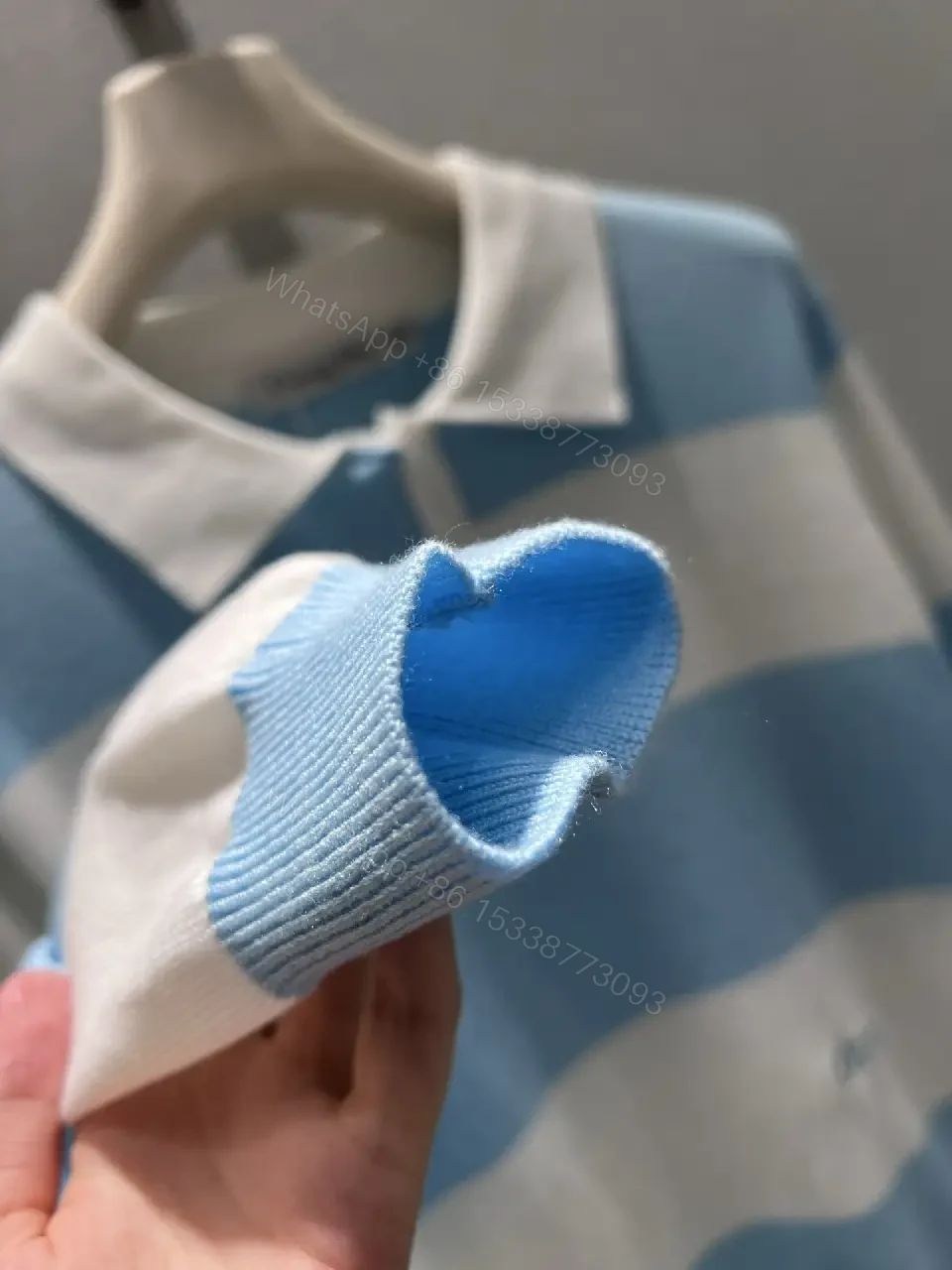 View 3 of Blue & White Striped Polo Knit with Signature Charm