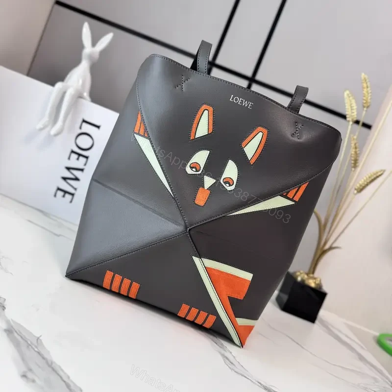 Bold Geometry Fox Tote: Color-Block Faux Leather Carryall — view 1